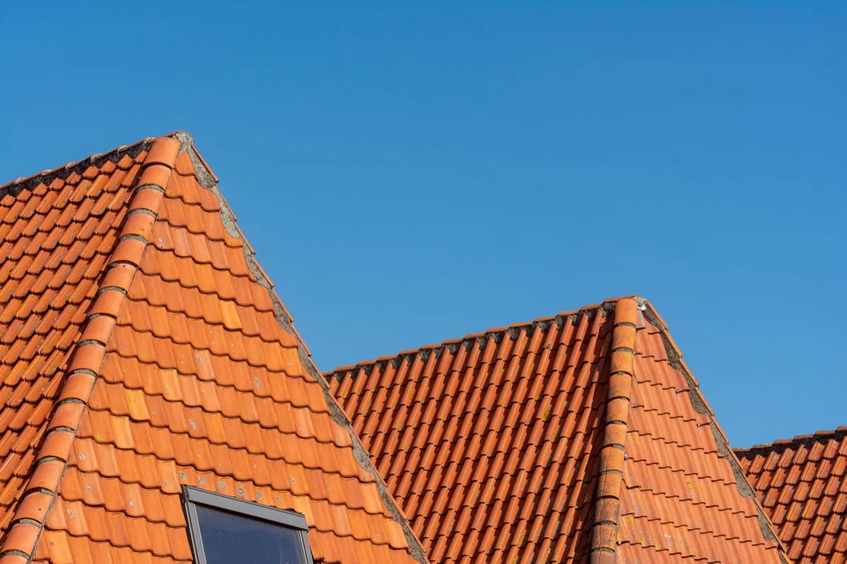 Clay barrel tile rooflines on homes in Decatur, IL