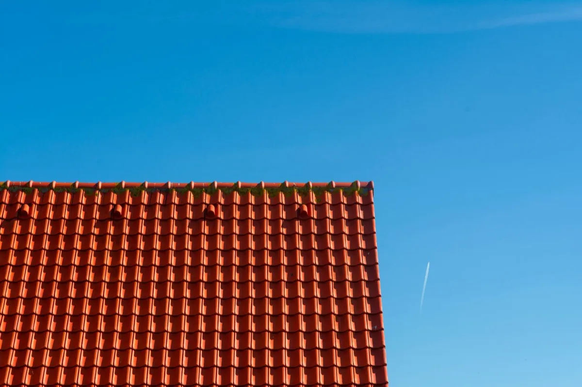 Tile roof gable in full sun, the kind of exposure that sets roof life in Decatur, IL